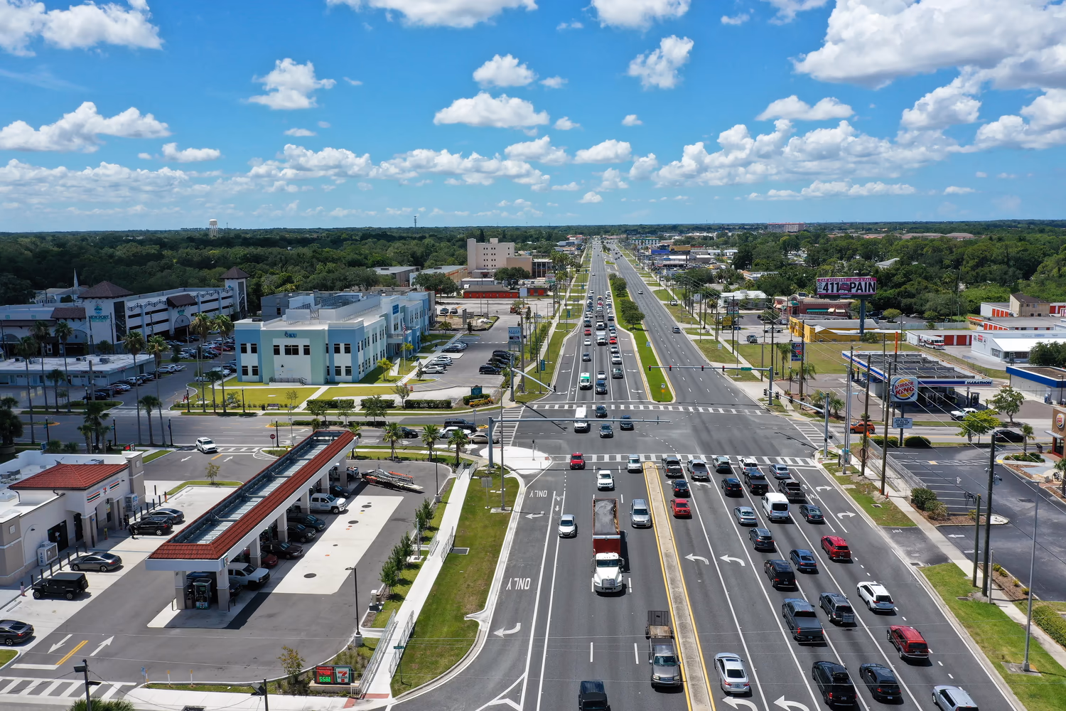 An example of a stroad: 5-6 car lanes in each direction with many turnings and junctions leading to highly spaced apart buildings with large car parks